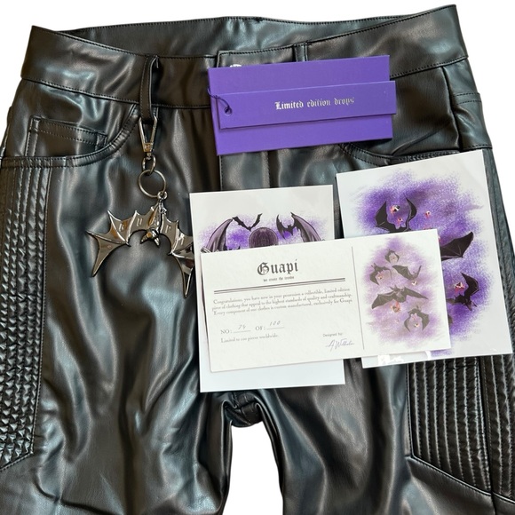 NWT Guapi Biker Aaron Wilhelm Black Faux Leather Pants Metal Bat Charm Size 28 - Picture 1 of 8